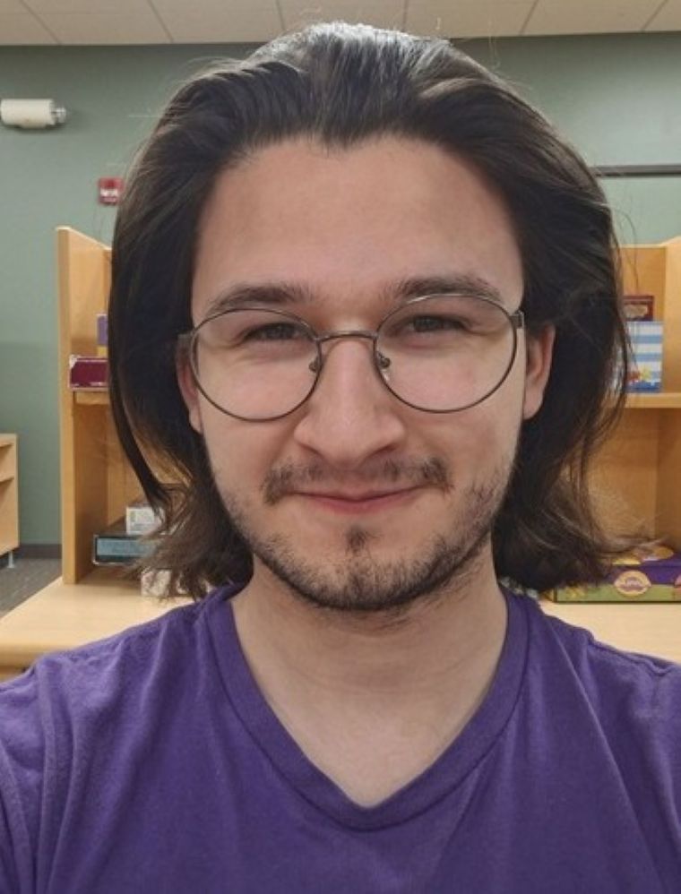 JD Deninger wearing glasses