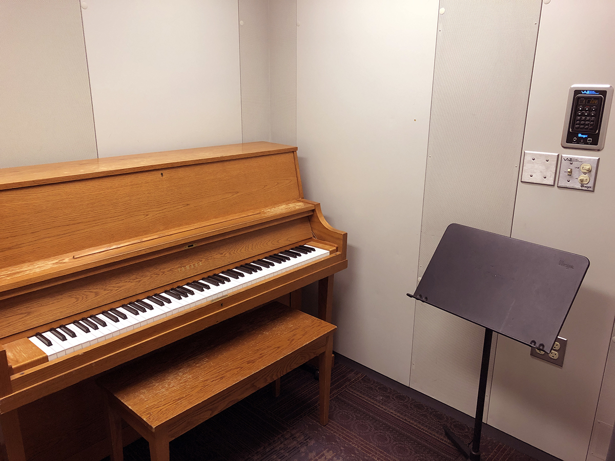 piano in a practice room
