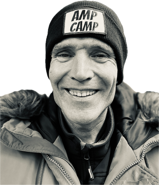 Image of Kevin Droe with knit hat that says, "Amp Camp"