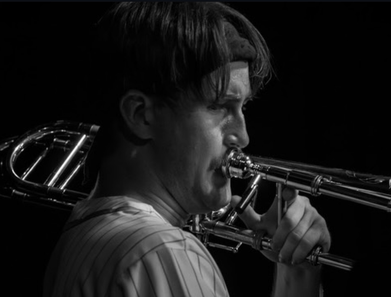 Riley Capper playing the trombone