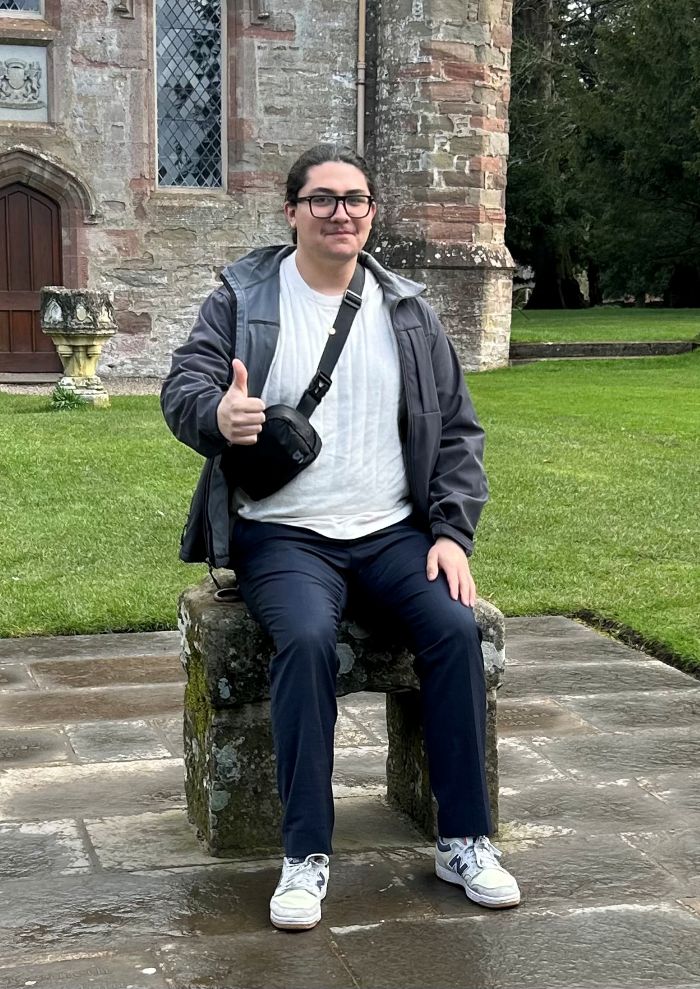 Marco Olachnovitch, sitting outside