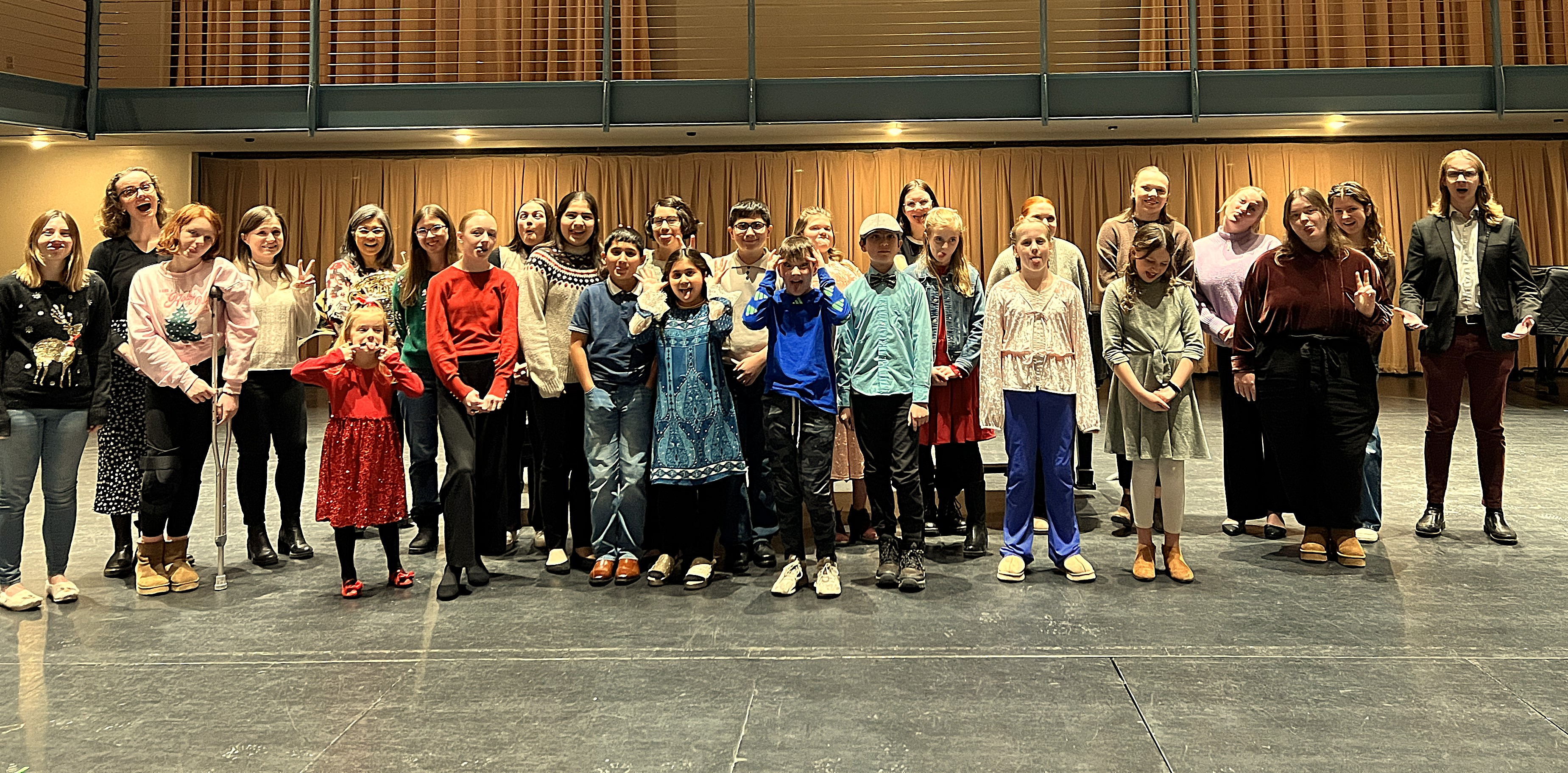 silly picture of teachers and students after a CMS Recital