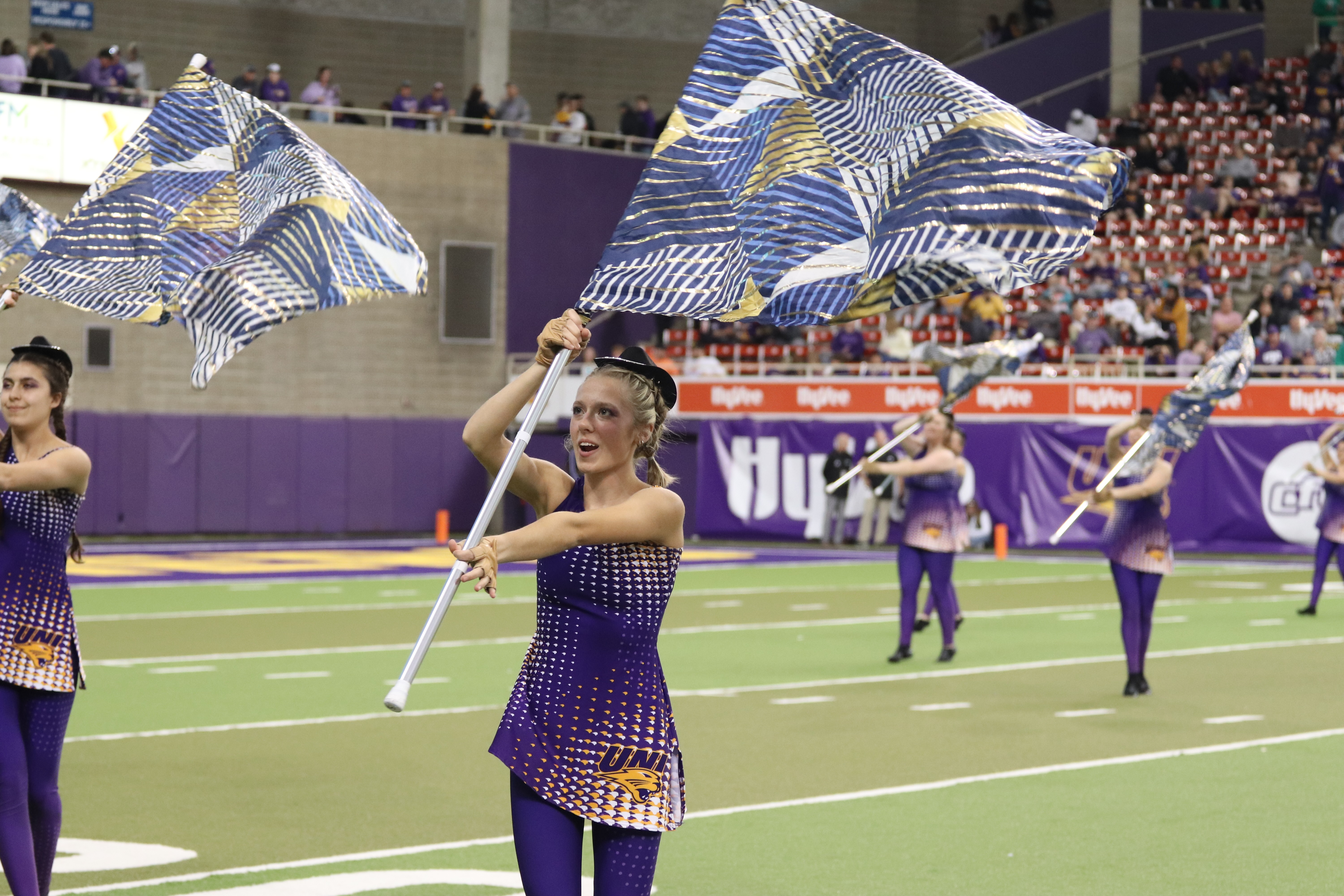 The PBM Colorguard performing on the field. 