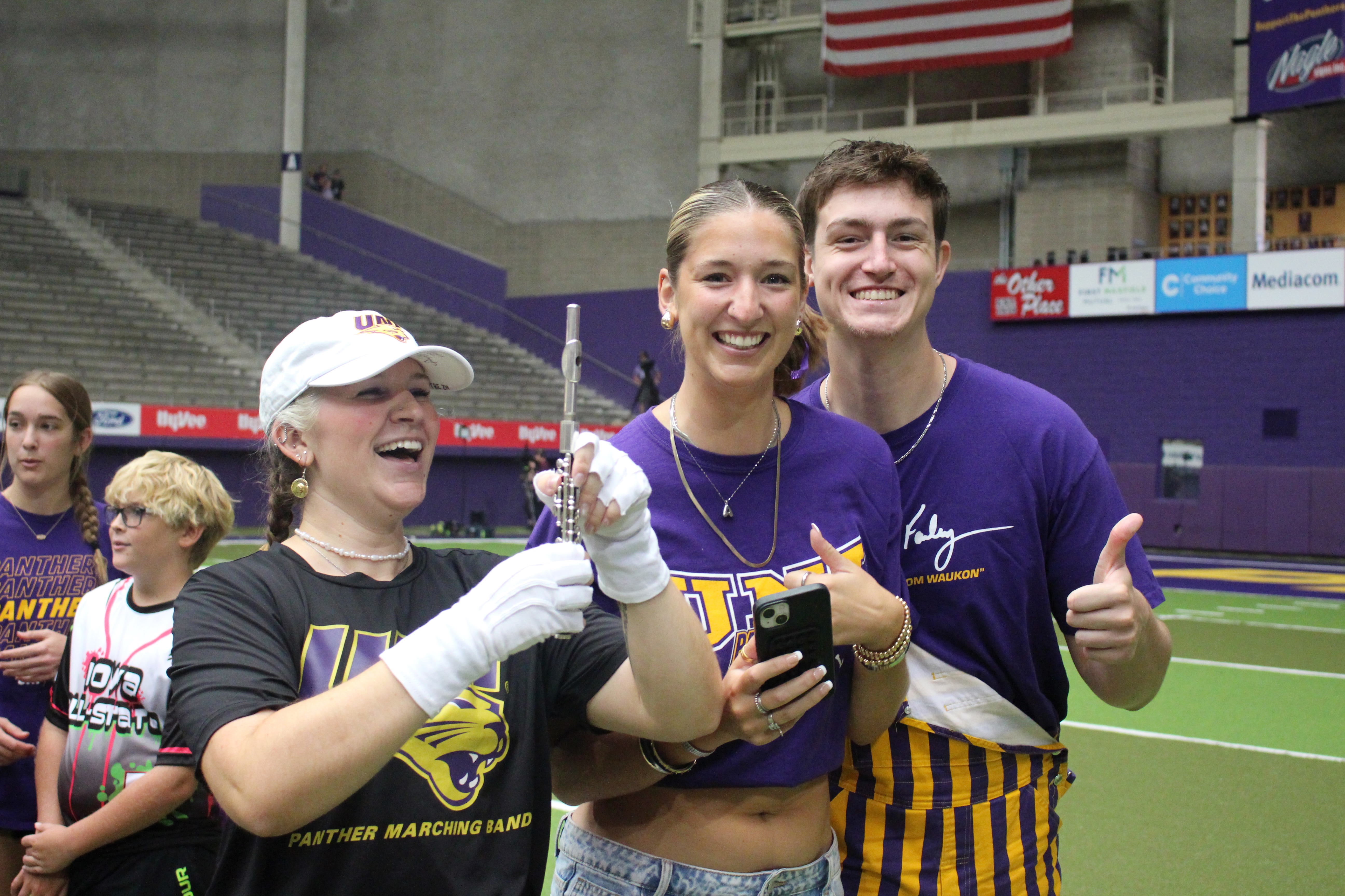 A PMB member and guests enjoying a gamed dress rehearsal on the field. 