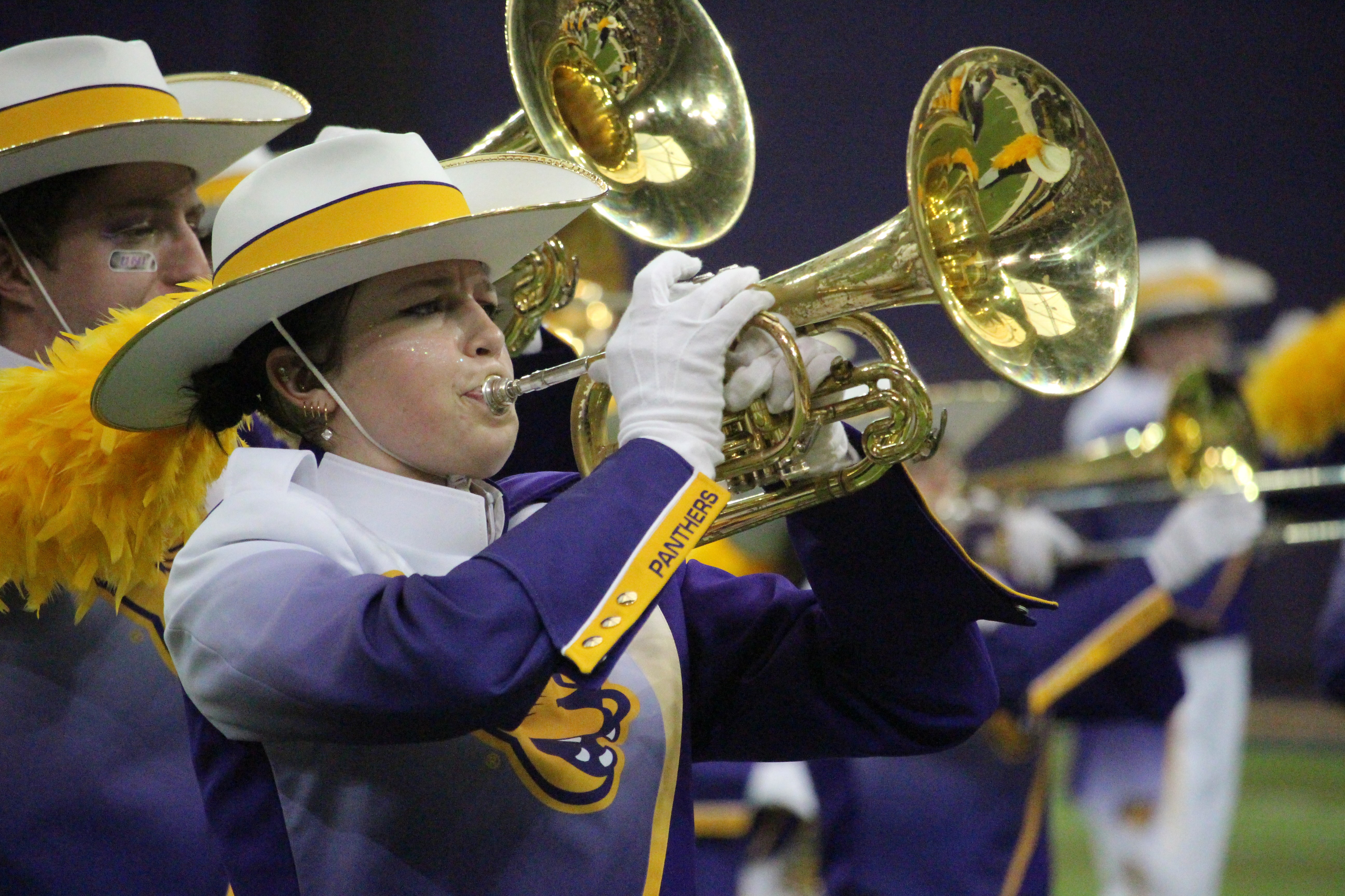 PMB members performing on the field, featuring mellophones.