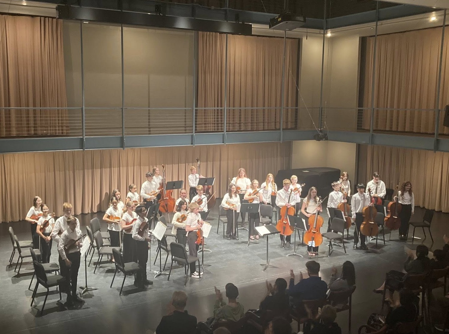 A middle school orchestra in concert